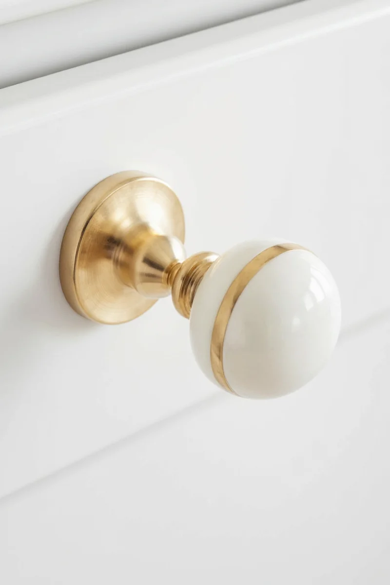 Kitchen with color-coded cabinet knobs for kids