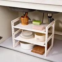 

2019 Popular lower sink kitchen plastic rack 2 Tier Expandable under sink shelf organizer plastic storage shelf for home