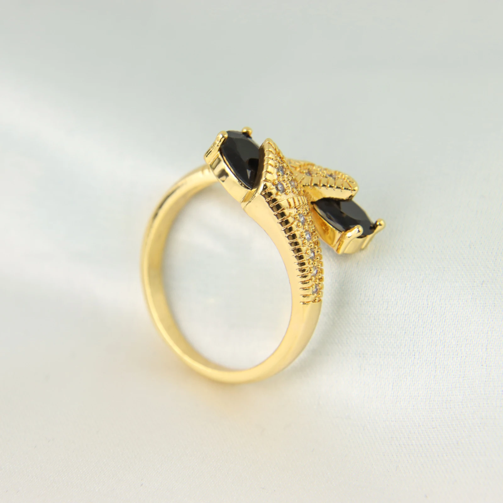 

Noble Double Head Snake Gold Plated Adjustable Blue Moissanite Ring