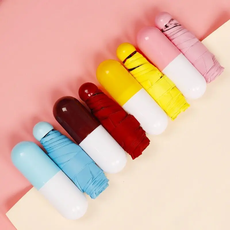 

Mini 5 folding capsule umbrella in capsule case ultra light anti UV mini pocket umbrella custom logo windproof rain umbrella, Customized color