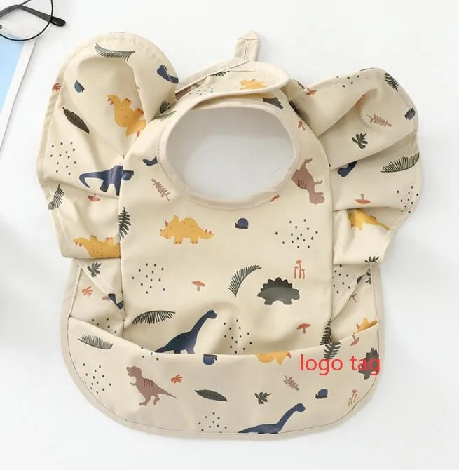 

Amazon Hot Sale Ins Waterproof Toddler Bibs with Food Catcher Infants Feeding Clothes Wing Ruffle Baby Smock Bib for Girls