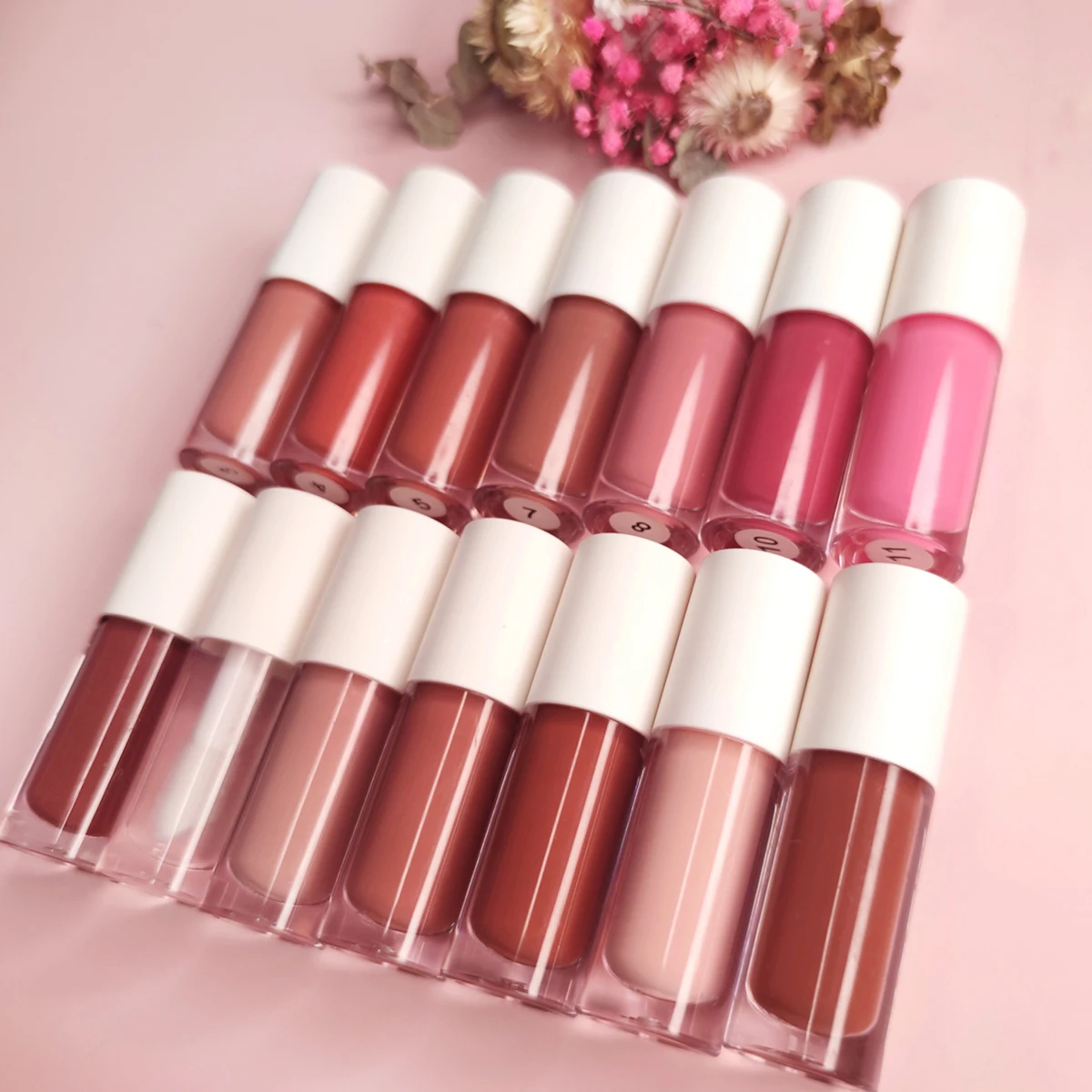 

Wholesale nude lipgloss bulk with no labels long lasting private label glitter cute lip gloss