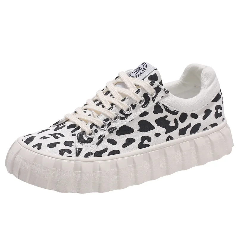 

Wholesale new design custom branded sport casual canvas shoes women