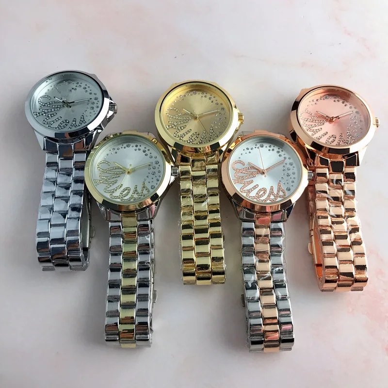

Women's and men's fashion quartz watch fashion style silver dial letter style fashion watch Stainless Steel Sapphire Logo Watche