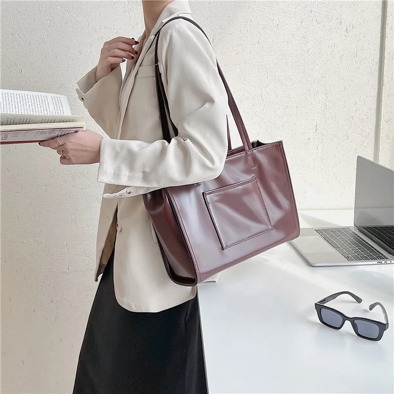 

Korean design new bag women's large capacity Tote Pu handbag fashion temperament single shoulder bag