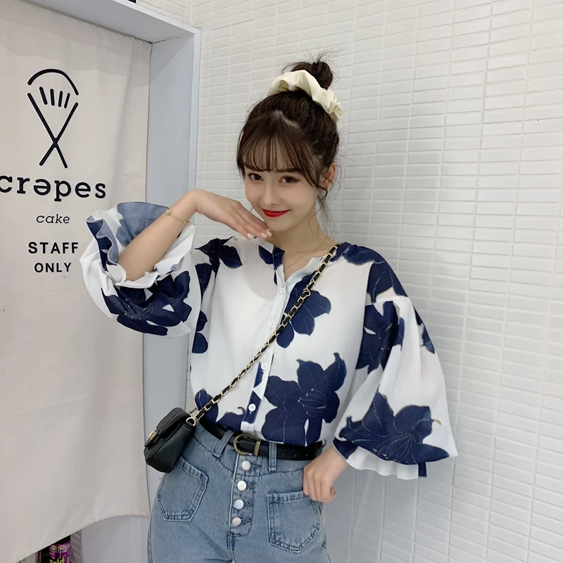 

2021 spring and summer new all-match chiffon shirt female design sense niche floral shirt female