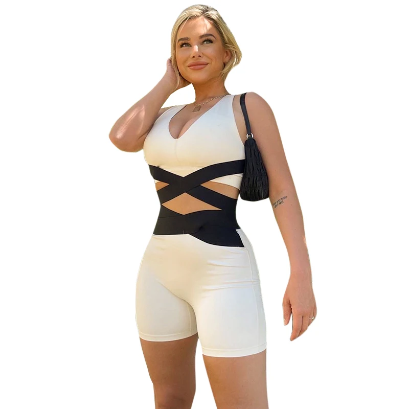 

2021 New trendy spring dresses women patchwork bandage crop top hollow out vest two piece pants set