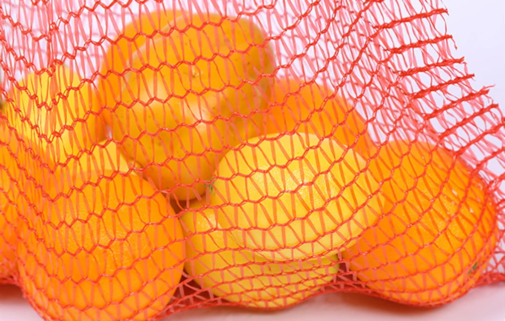 廉价抽绳橙色 pe 拉舍尔网状大蒜,洋葱网袋