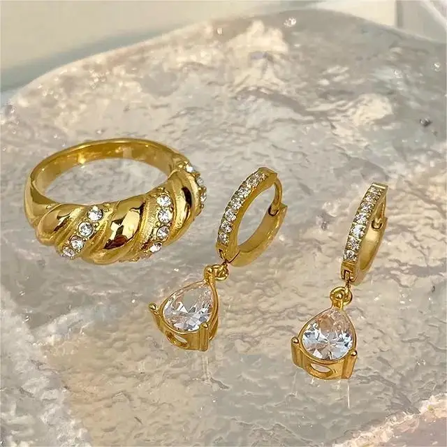 

Hot selling ins minimalist teardrop earrings jewelry stainless steel gold-plated micro set water drop shaped zircon earrings