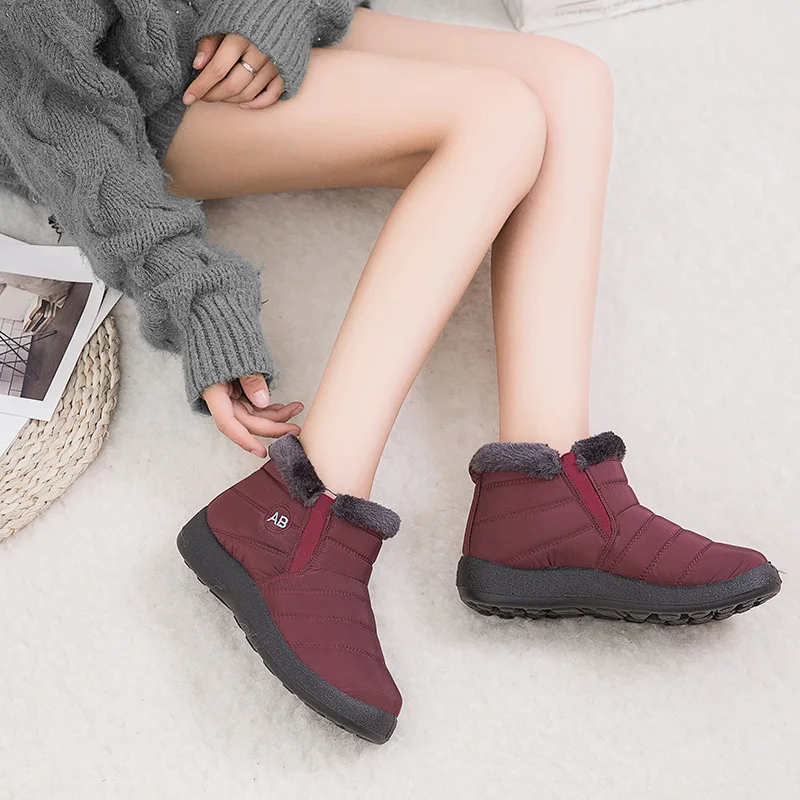 

Cotton shoes women's overshoot waterproof short boots warm oversized snow boots