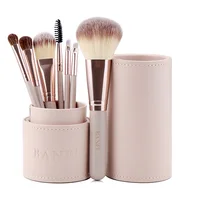 

Banfi American market popular brush style 7pcs wooden handle makeup brush set with cylinder round makeup holder