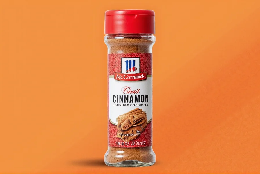 Close-up of McCormick cinnamon bottle showing fine reddish-brown powder texture and label details