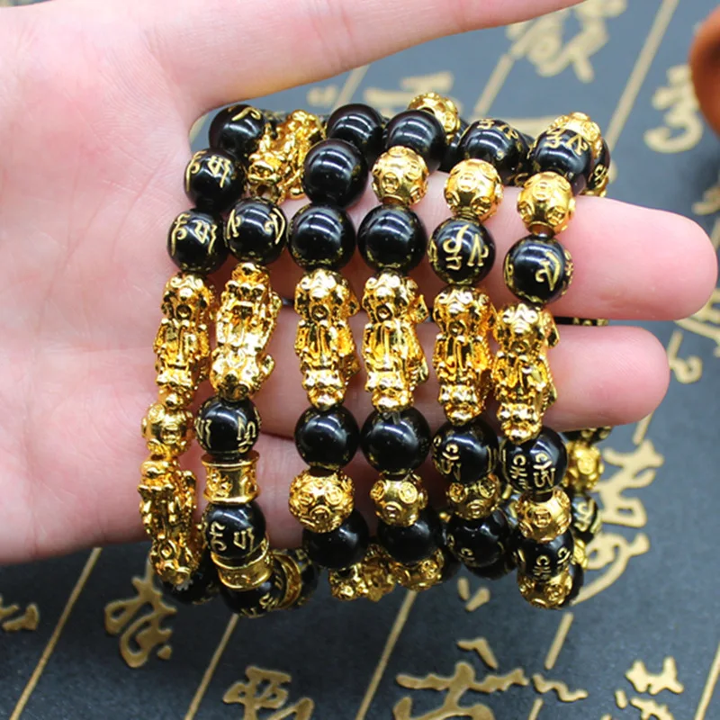 

Hot selling carved 10mm Chinese good luck charm bracelet elastic gold Pixiu feng shui black obsidian wealth bracelet