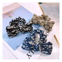 

Wholesale Fashion Women Hair Accessory Rubber Hair Bands Elastic Letters bowknot Hair Circle Women Ponytail Holders KL3301