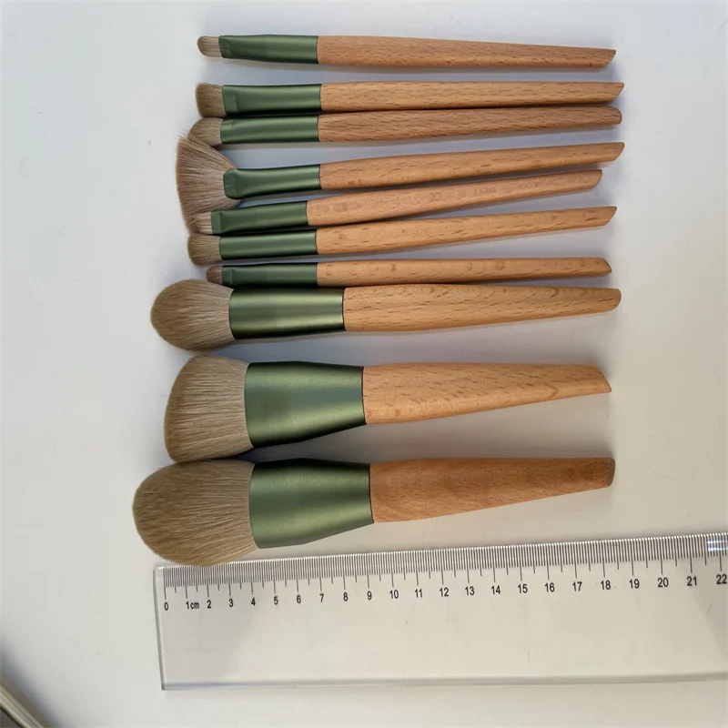 

Hot Products Makeup Brushes Supplier 10 Pieces Green wooden handle pack with beautiful bag makeup brush set, As the picture