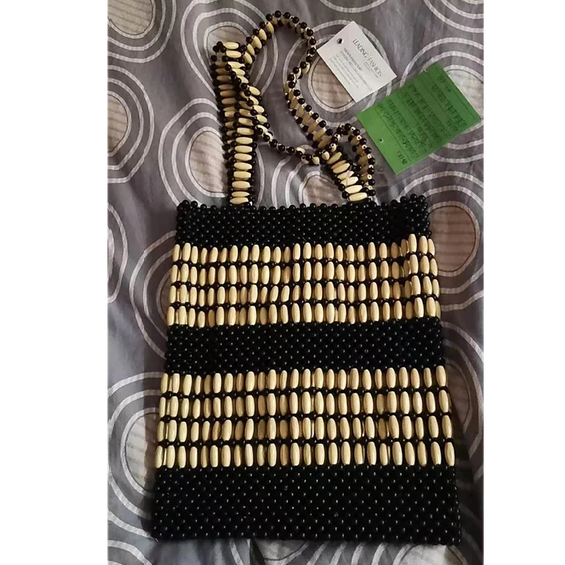 

2021 new model fashion wooden bead shoulder backpack yellow black and white mix bag