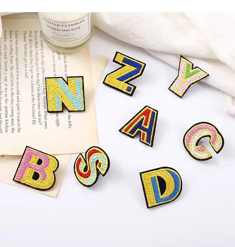 

Factory direct sale embroidery Brooch 26 English letters cloth paste personalized clothing accessories patch