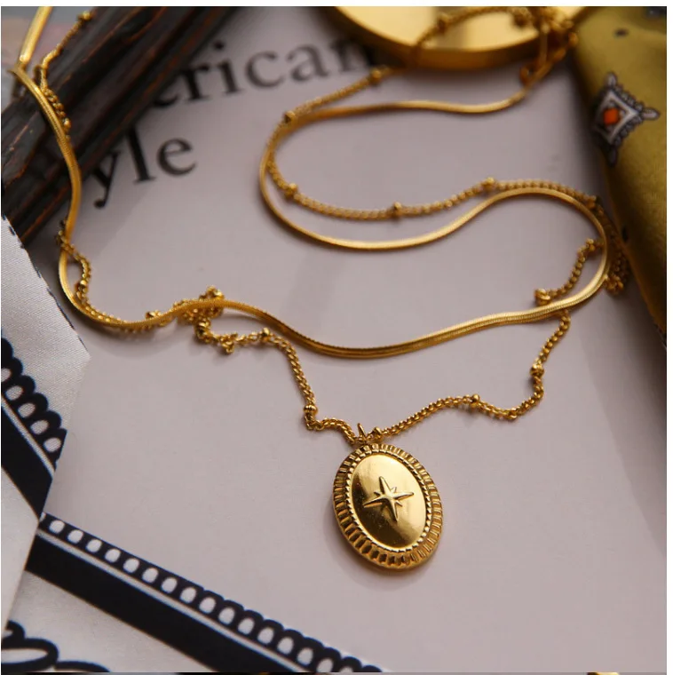 

Oval Medal Neptune Double snakebone sweater chain Necklace in titanium steel plated in 18K gold necklace women