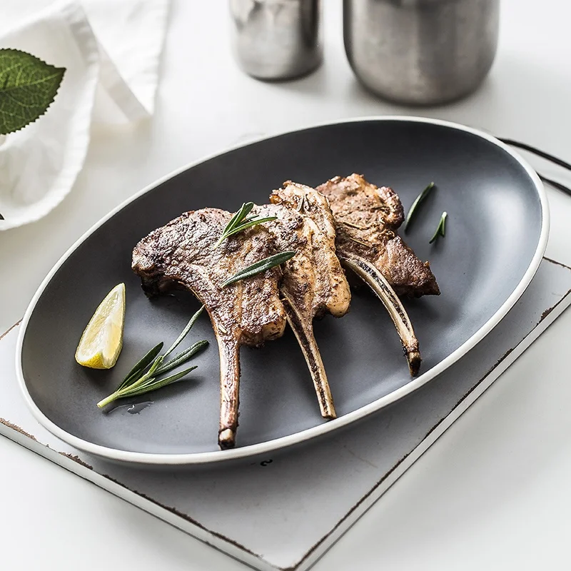 

China factory wholesale cheap price 11 inch oval shape black / white / Grey color ceramic fish plate