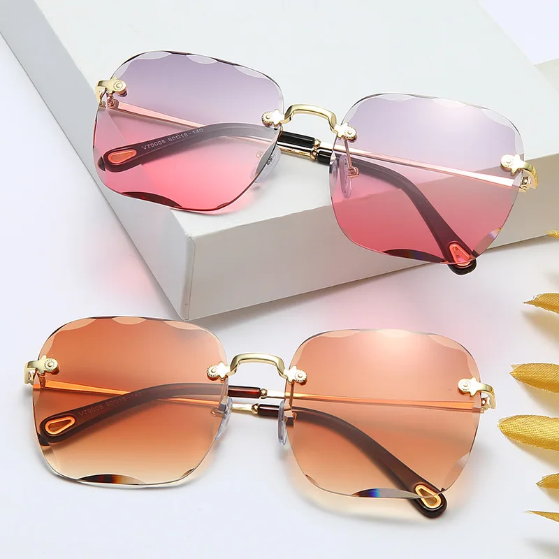 

Sun glasses men's fashionable frameless perforated women's sunglasses Diamond rimmed gradient multi-edge glasses fashion