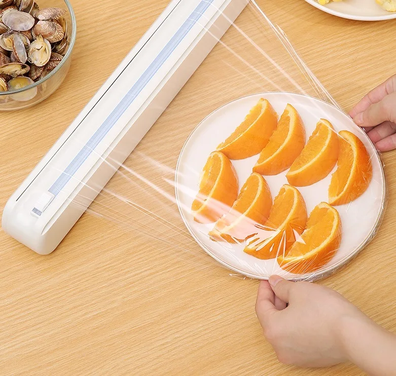 

Kitchen supplies Sliding knife type food cling film cutter Suction cup adjustable household storage tool