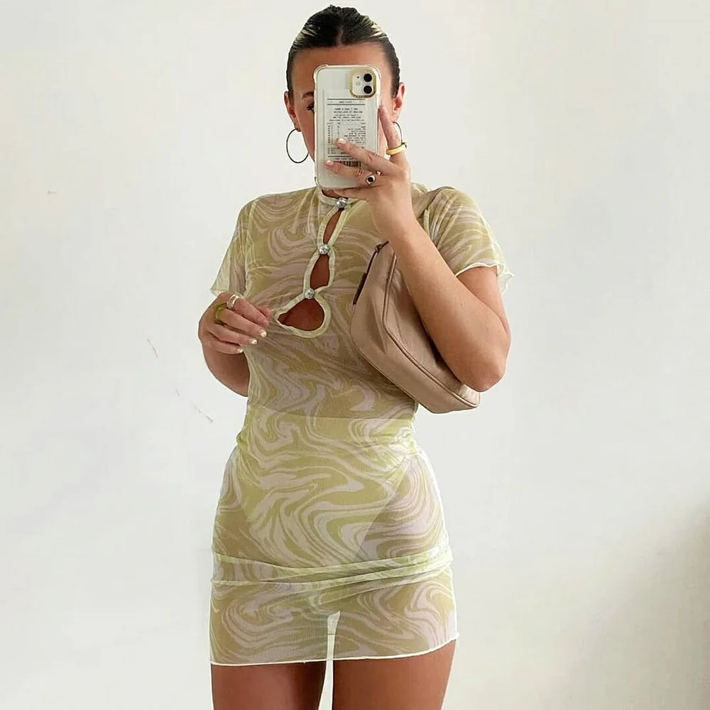 

Guangzhou Supplier Sexy Hollow Nail Button Perspective Dress Women