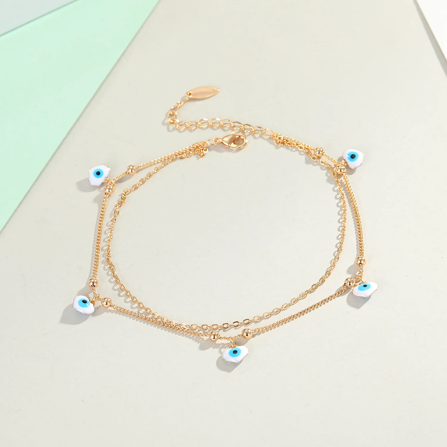 

2021 Fashion Real Gold Plated Water Drop Heart Evil Eyes Anklet Multi Layer Foot Chain Evil Eyes Ankle Bracelet For Women