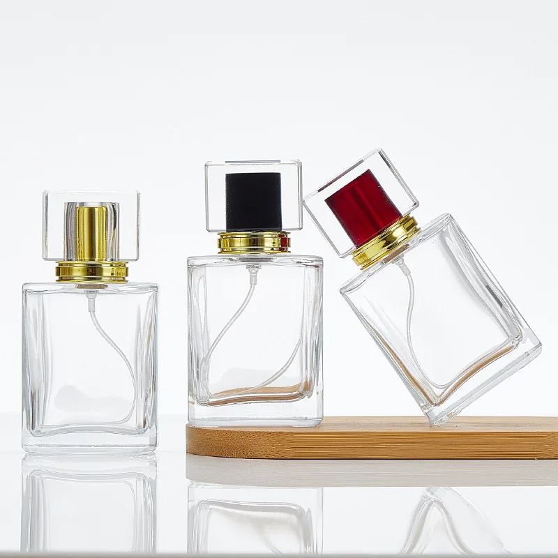 Luxury transparent glass perfume bottle with acrylic cap  Screw recyclable perfume bottle 50mL