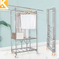 

AmazonBasics Silvery Garment Hanging Rolling Rack Cloth Drying Stand With Top and Bottom Shelves