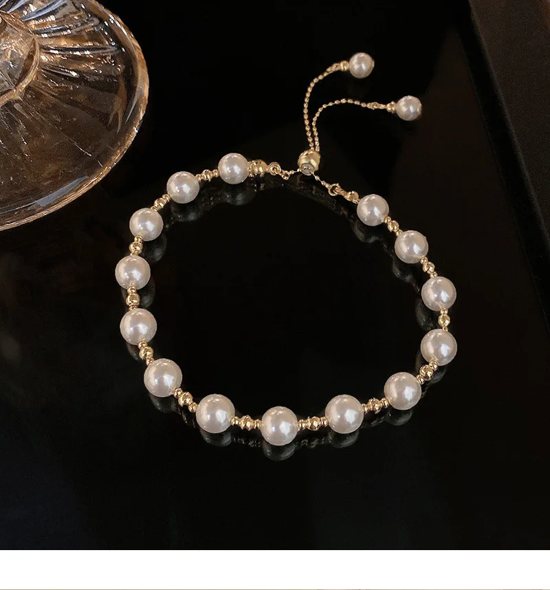

Japanese and Korean high-end design sense pull-out pearl charm bracelet for women's light luxury and niche versatile jewelry