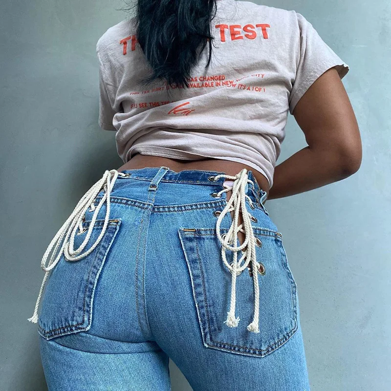 

Hot sales blue long jeans outfits women Manufacture hollow strap lady legging jeans Creative back contrast eyelet denim pants, Picture