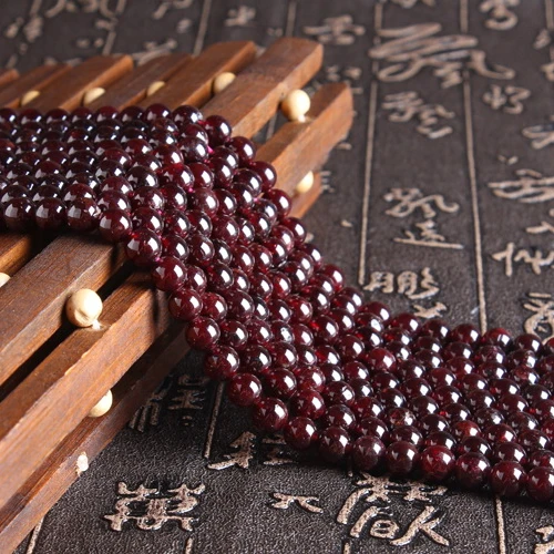 

China Manufacture natural garnet crystal loose beads for DIY