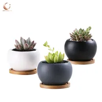 

Quality 3.5inch ceramic small flower pots for succulent plants with bamboo tray wholesale
