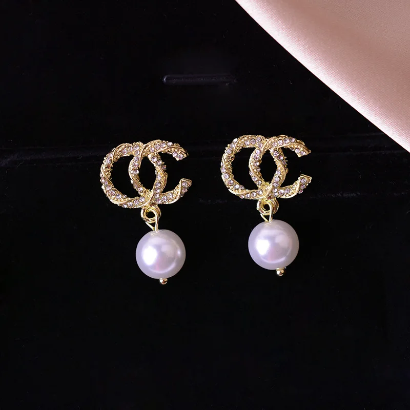 

HongTong Silver 925 Earring Needle Korean Style Temperament Designer Inspired Pearl Diamond Earing cc Earrings, Picture