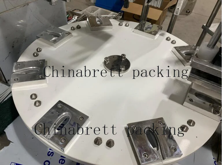 Small manual honey spoon filling machine cream packing machine