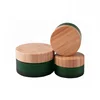 /product-detail/customized-green-glass-15ml-30ml-50ml-cosmetic-round-bamboo-jar-60721701085.html