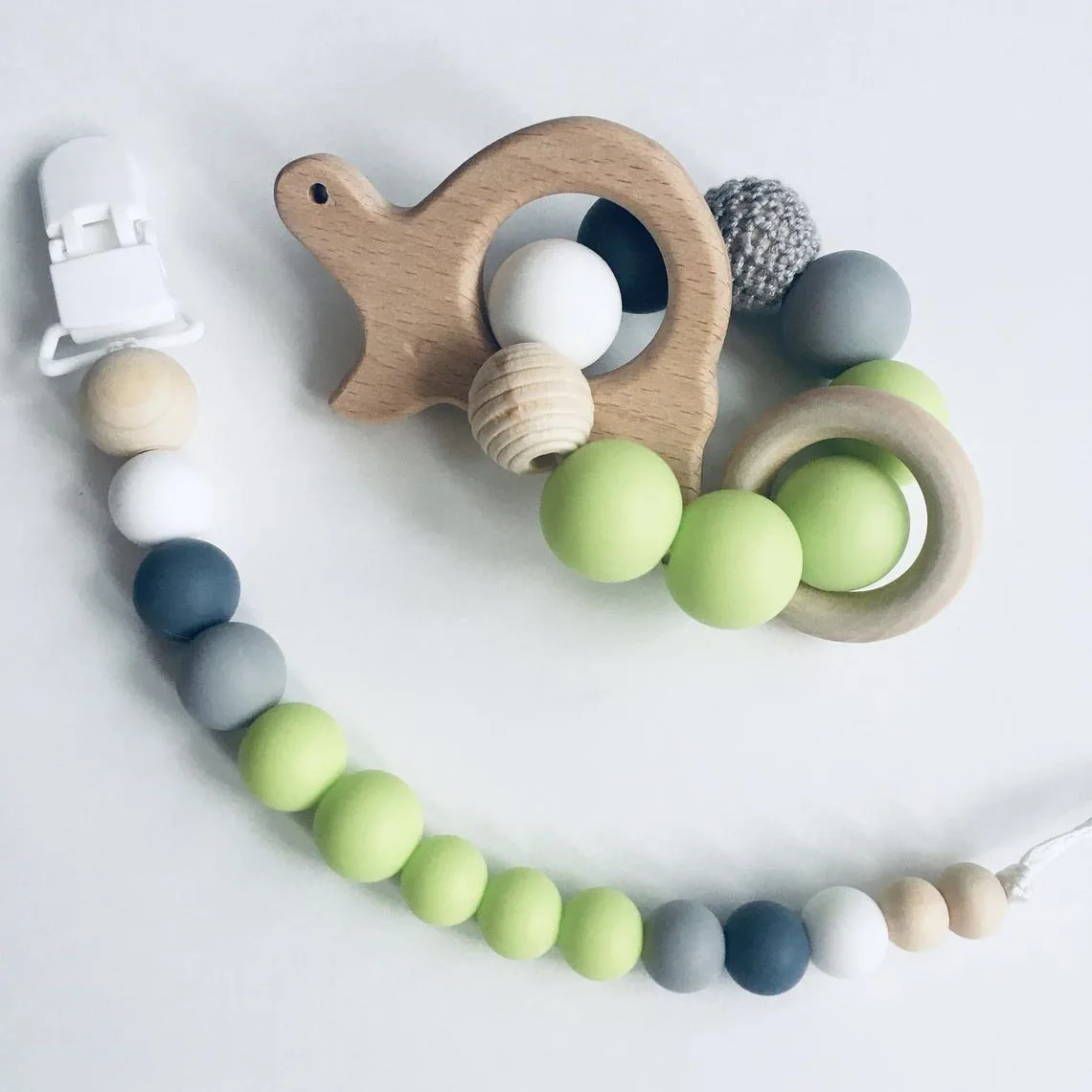 

Wholesale Infant Teething Silicone Beads Plastic Pacifier Clips Crochet Wood Silicone Bracelet With Animal Ring