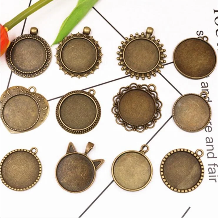 

wholesale different shape vintage antique bronze plated alloy cabochon base empty pendant jewelry tray designer charms