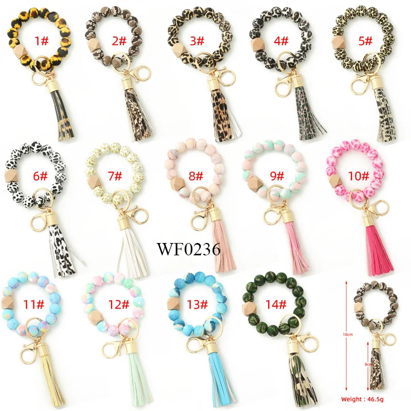 

USA 2022 HOT SALE ONLINE Rainbow patterns leopard print silicone bracelets silicone keychain bracelet with tassel custom