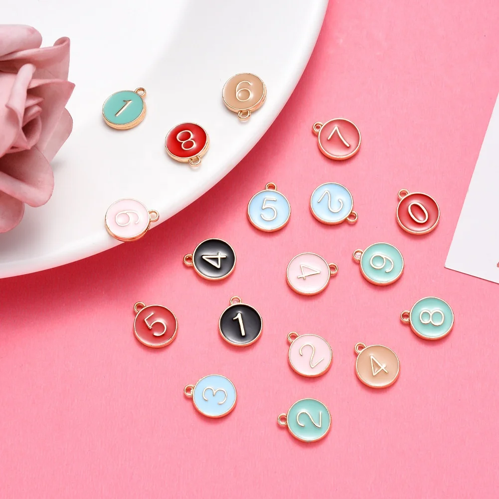 

Paso Sico Popular 10pcs/bag 0-9 Arabic Number Round Nail Pendant  Colors 12*14.5mm Alloy Dangle Charms for Nail Art Designs