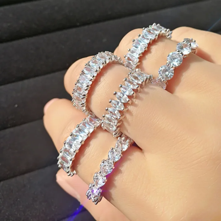 

2021 New Minimalist High End Zirconia Pave Rings Stainless Steel Baguette Rings Bling Crystal Iced Out Ring For Women, Picture shows