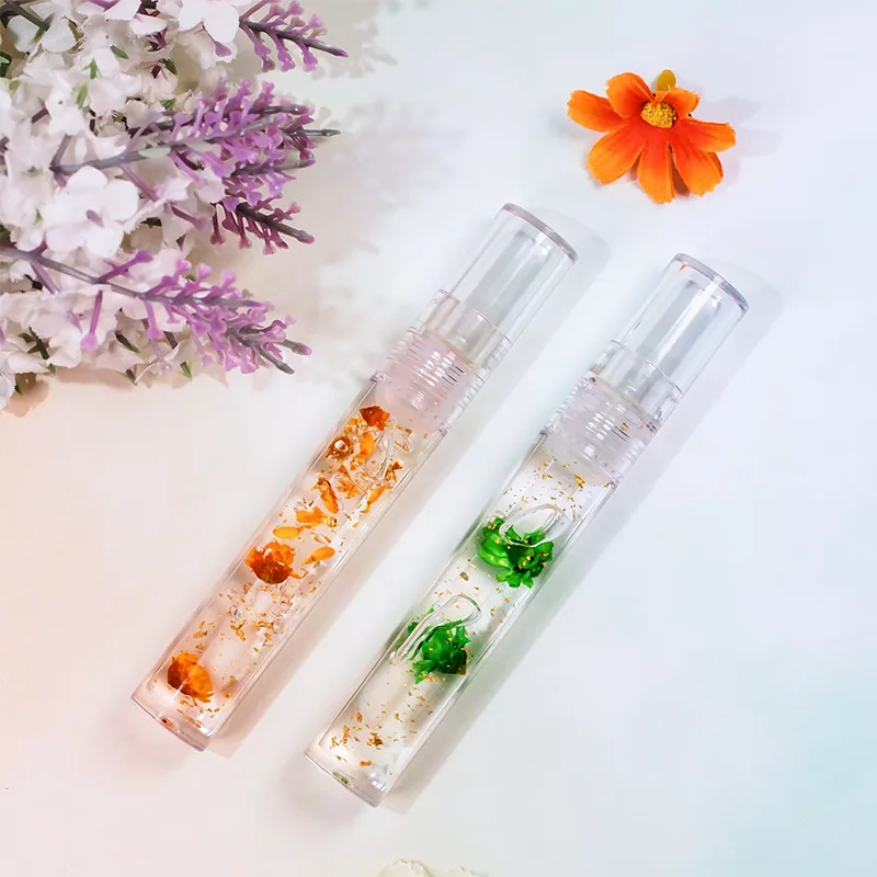 

Little Daisy flower lipgloss moisturizing plump lips transparent lip honey style without logo lip oil can print you own label, Customization welcome