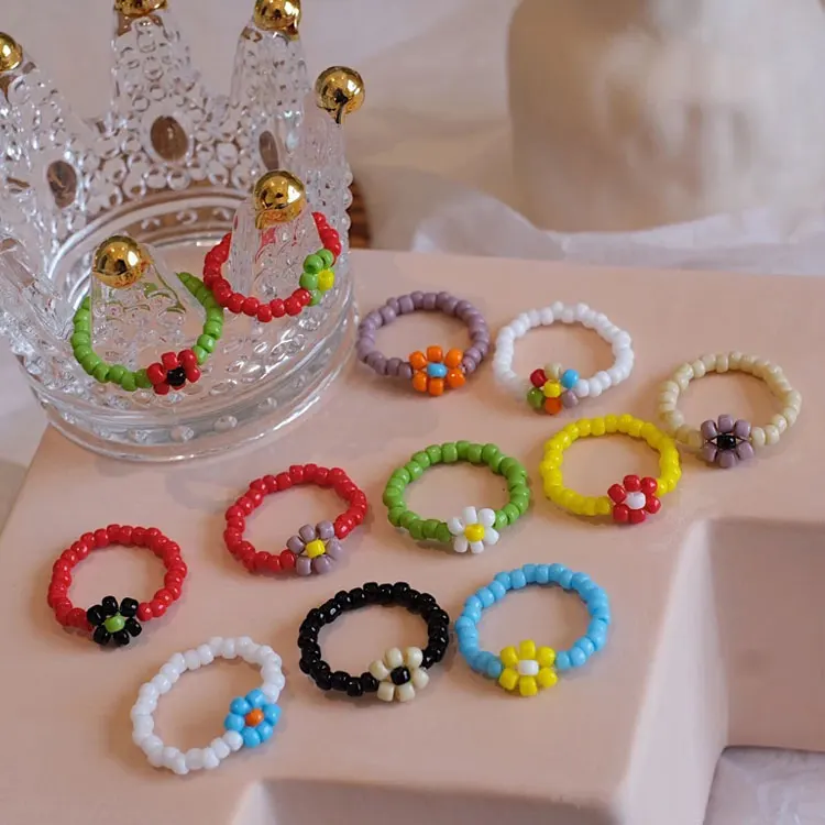 

SC Wholesale Daisy Flower Beaded Rings Jewelry Women Bohemian Colorful Hand Woven Elastic Flower Resin Acrylic Ring Beads Girls, White, green, black, yellow, red, purple