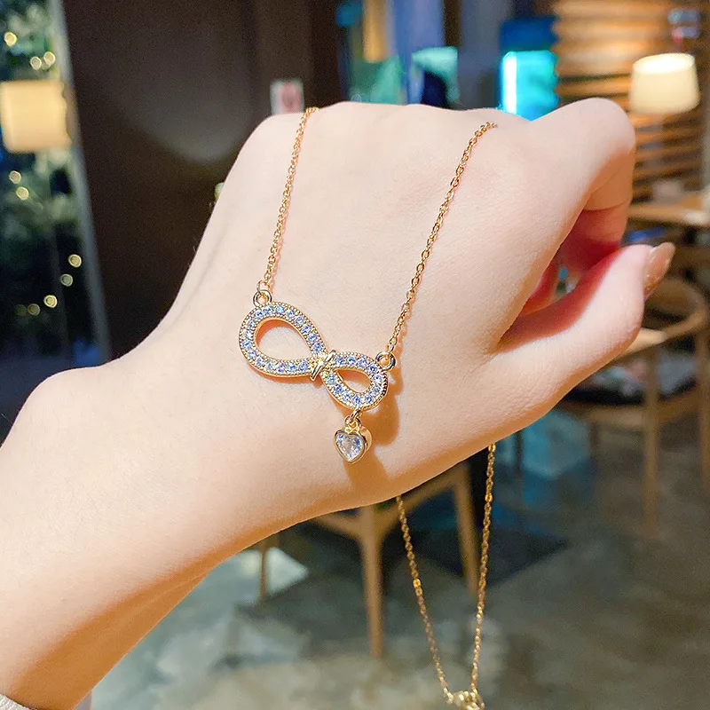 

Korean INS Gold Plated Titanium Steel CZ Bow Pendant Necklace Stainless Steel Zirconia Bowknot Clavicle Necklace