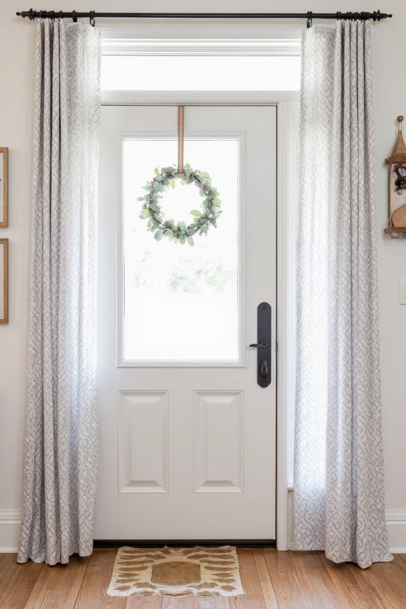 Custom double curtain rod system on front door