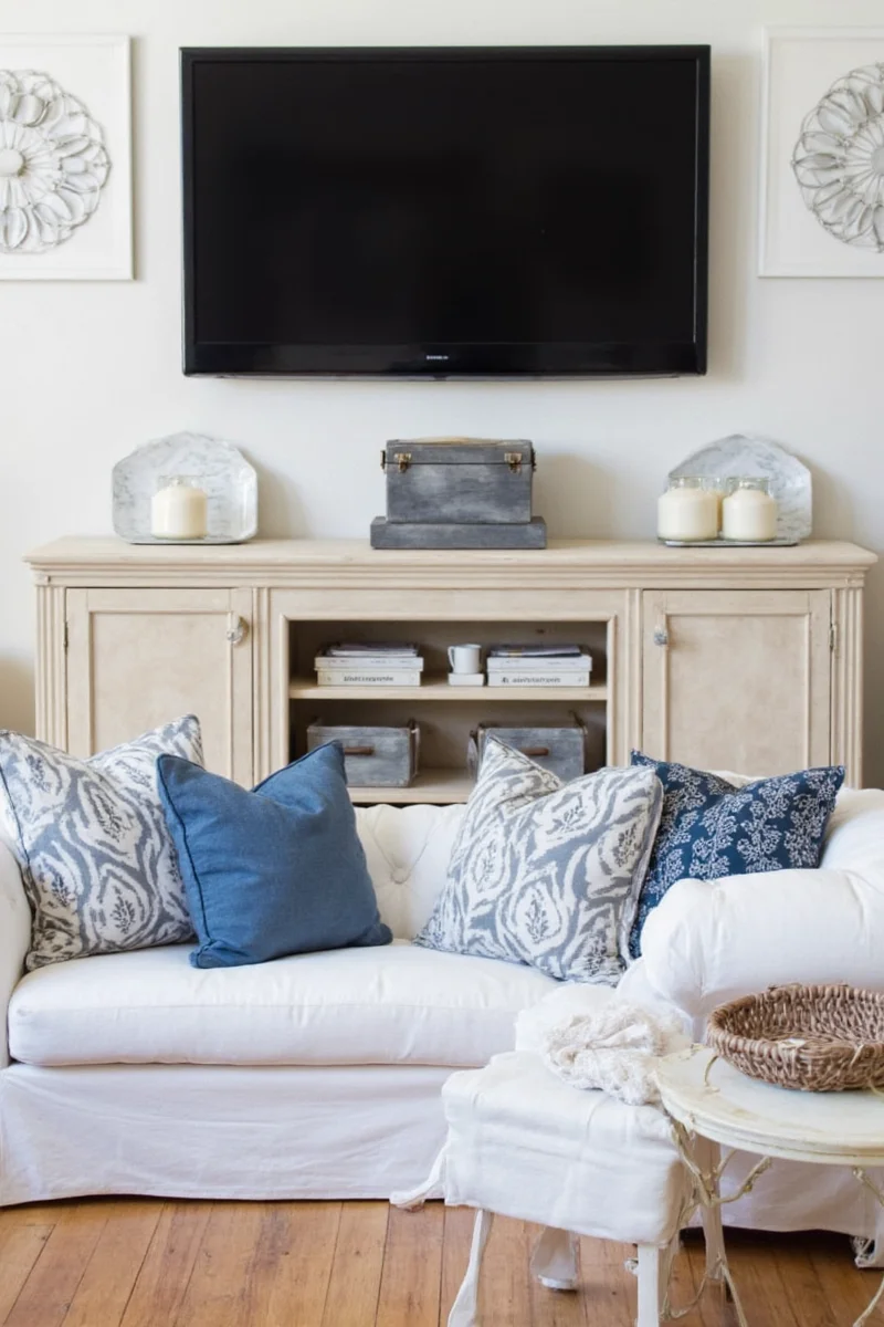 TV wall with chalkboard area and toy storage for kids