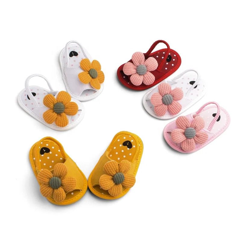

Wholesale Lightweight Big Flower Logo Fabric Flat Soft Sole baby sandals for indoor and outdoor