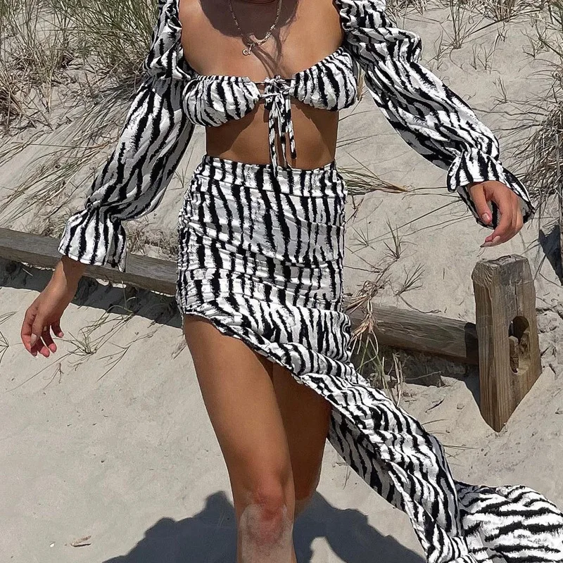 

Spring 2022 New arrival fashionable women long sleeve sexy crop top with maxi skirt ladies 2 piece set women