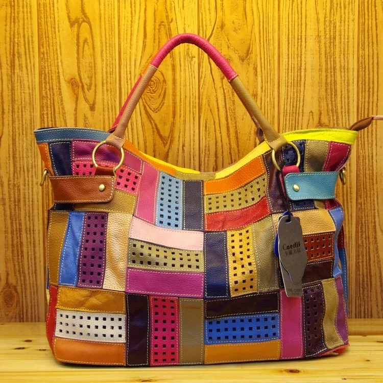 

Leather head layer cowhide large capacity sling handbags for women