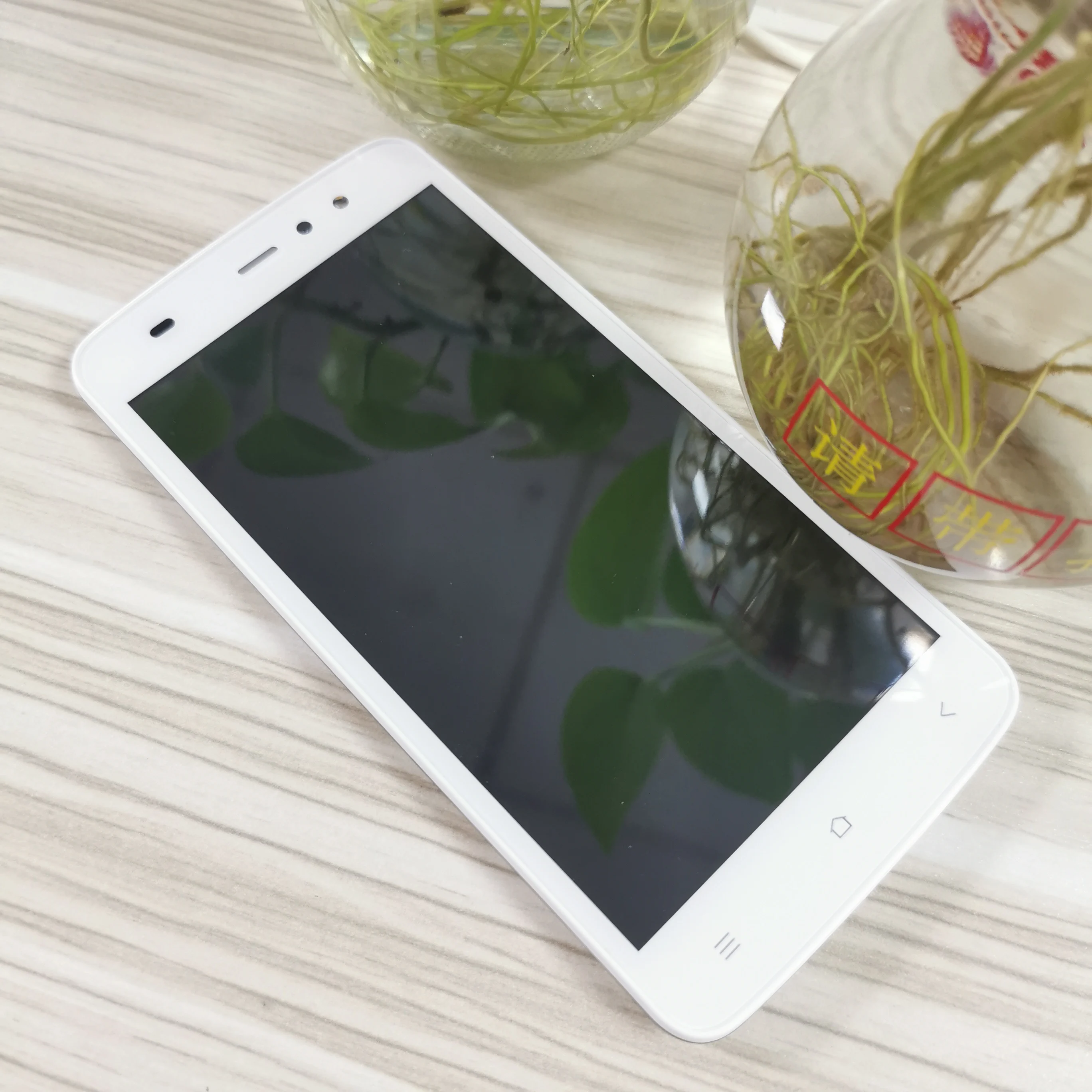 

Wholesaler cheaper price Gionee 5.0 inch 1GB/8GB dual sim andriod 3g netwoek overstock mobile phones, White